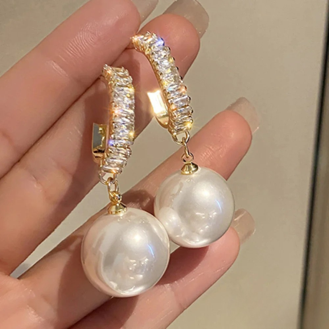 Boucles d'oreilles chiques avec perle et zircon