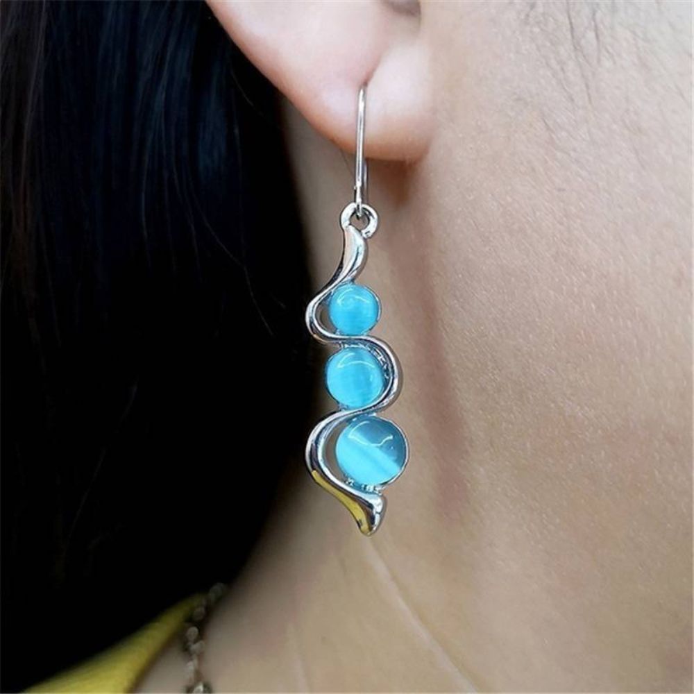 PAIRE DE BOUCLES D'OREILLES EN FORME DE GOUTTES BLEUES