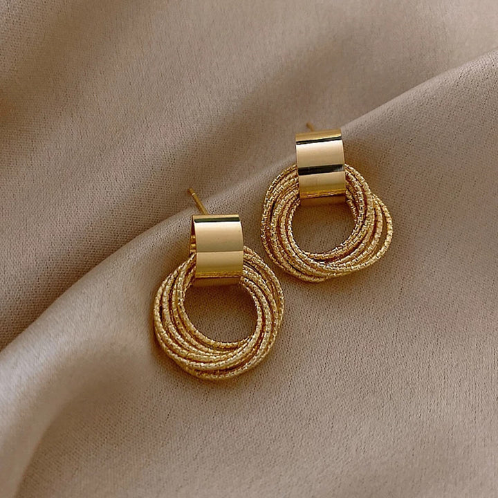 PAIRE DE BOUCLES D'OREILLES EN CORDON