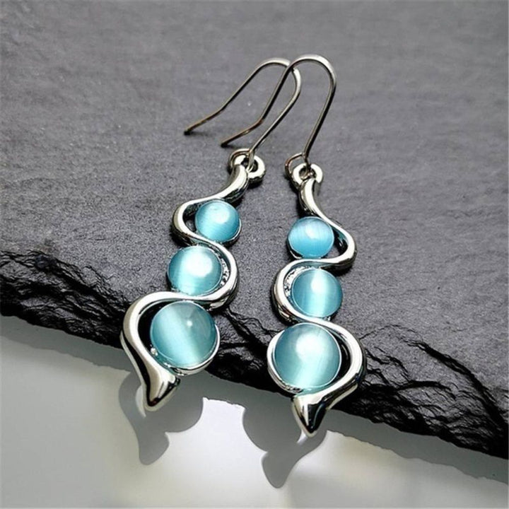 PAIRE DE BOUCLES D'OREILLES EN FORME DE GOUTTES BLEUES