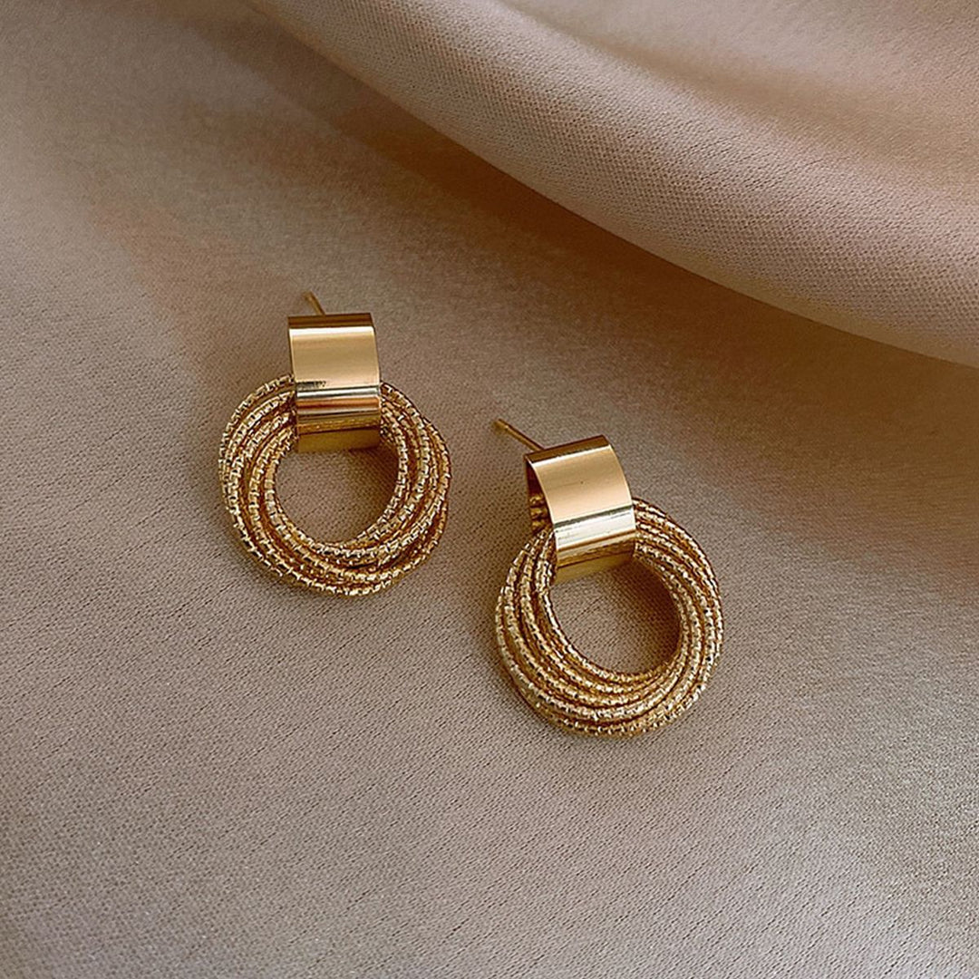 PAIRE DE BOUCLES D'OREILLES EN CORDON