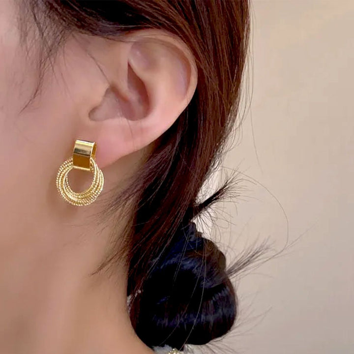 PAIRE DE BOUCLES D'OREILLES EN CORDON