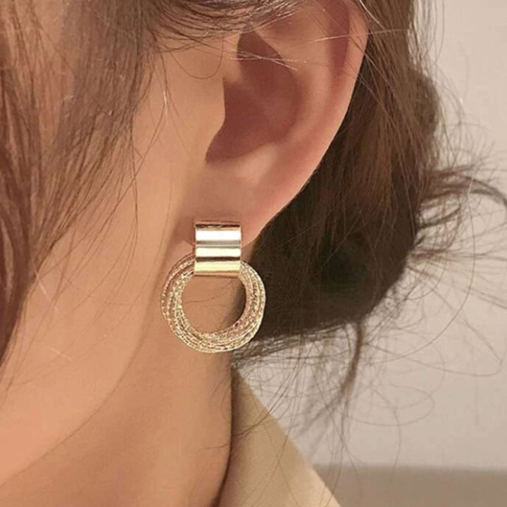 PAIRE DE BOUCLES D'OREILLES EN CORDON