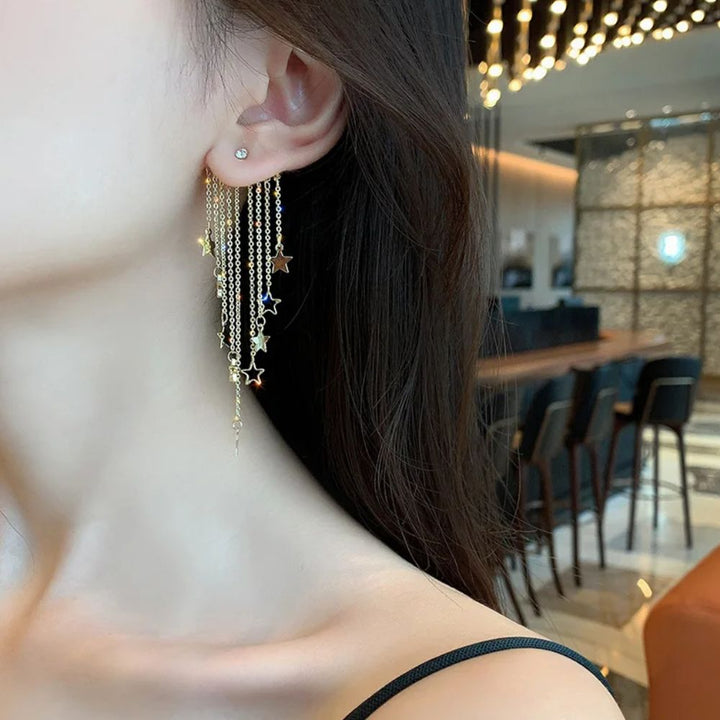 PAIRE DE BOUCLES D'OREILLES ÉTOILÉES AVEC FRANGES