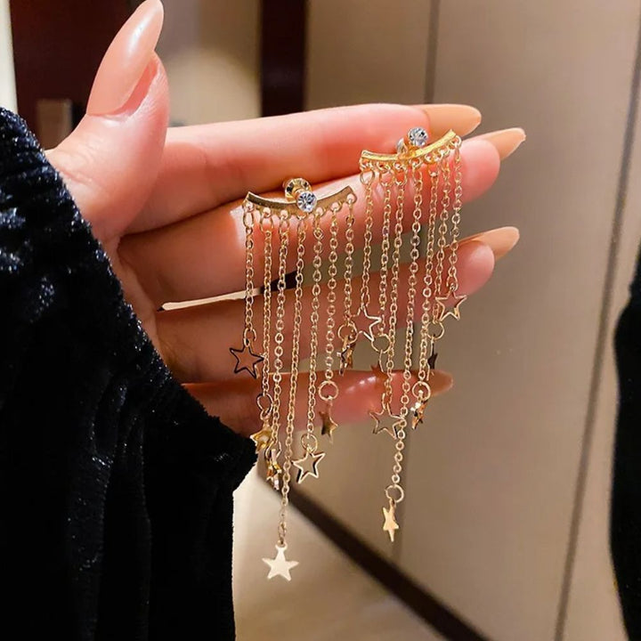 PAIRE DE BOUCLES D'OREILLES ÉTOILÉES AVEC FRANGES