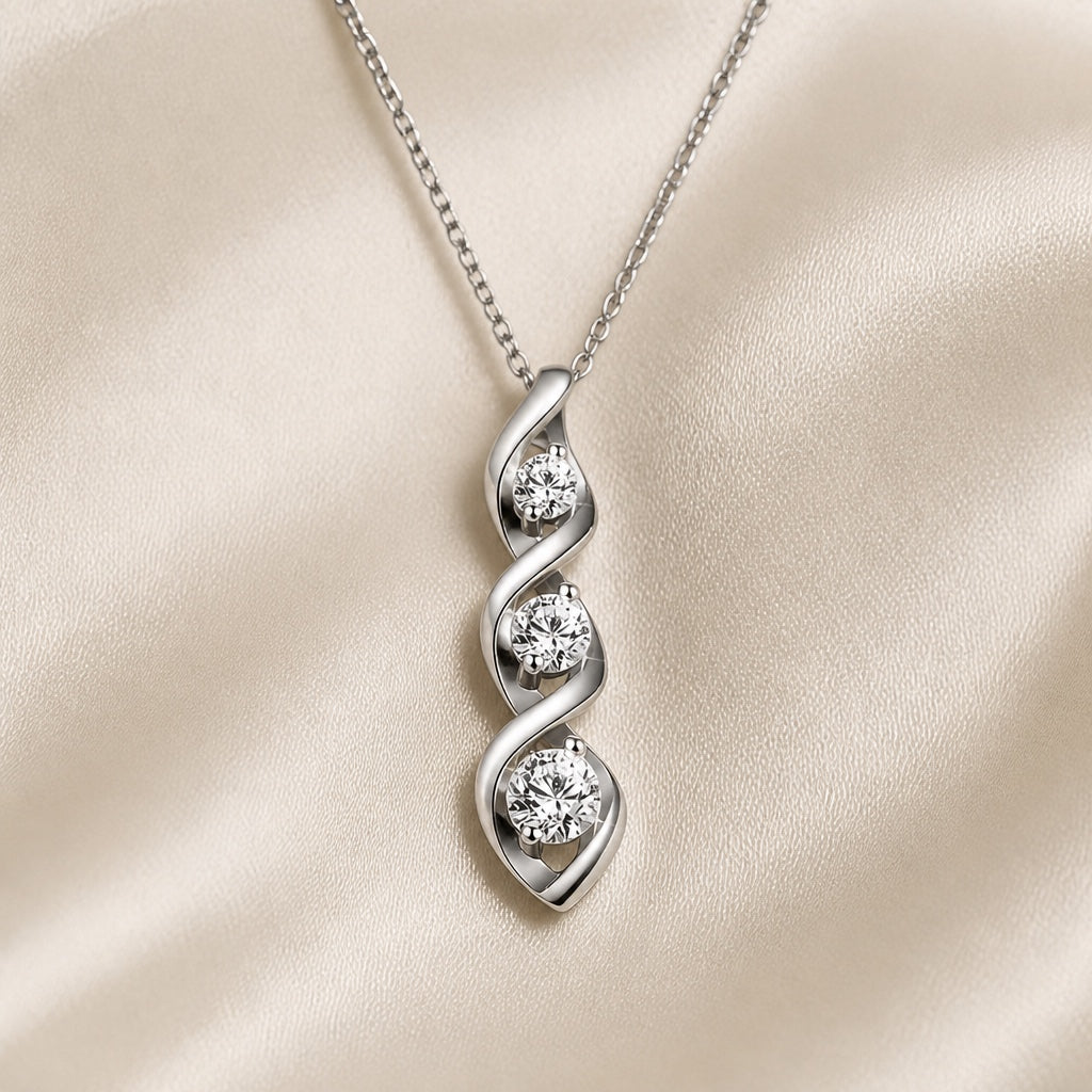 Collier en or blanc avec pendentif en forme d'infini et zircons