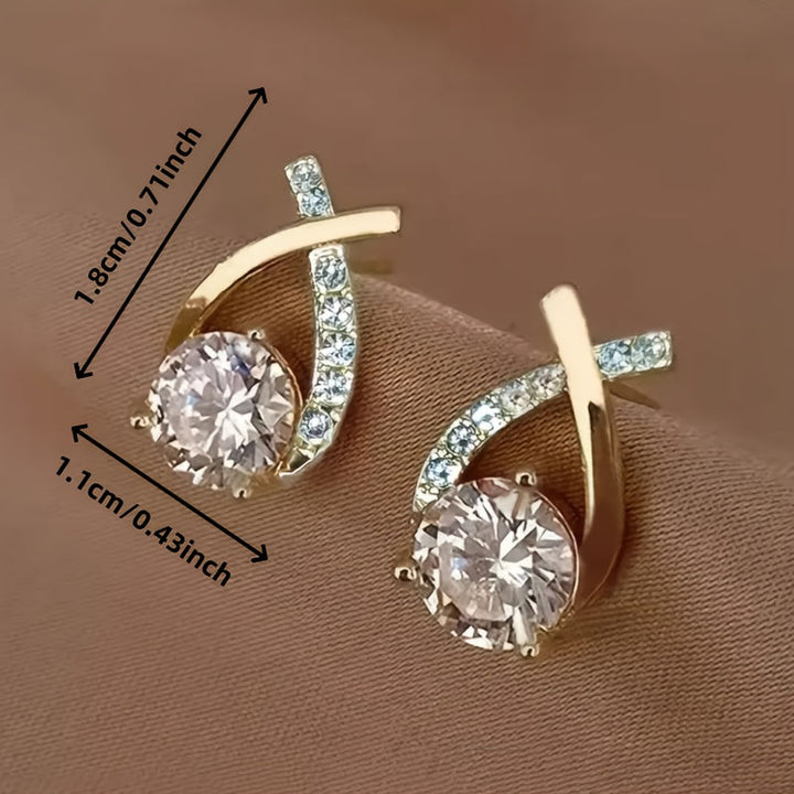 Boucles d'oreilles avec croix en or et zirconia