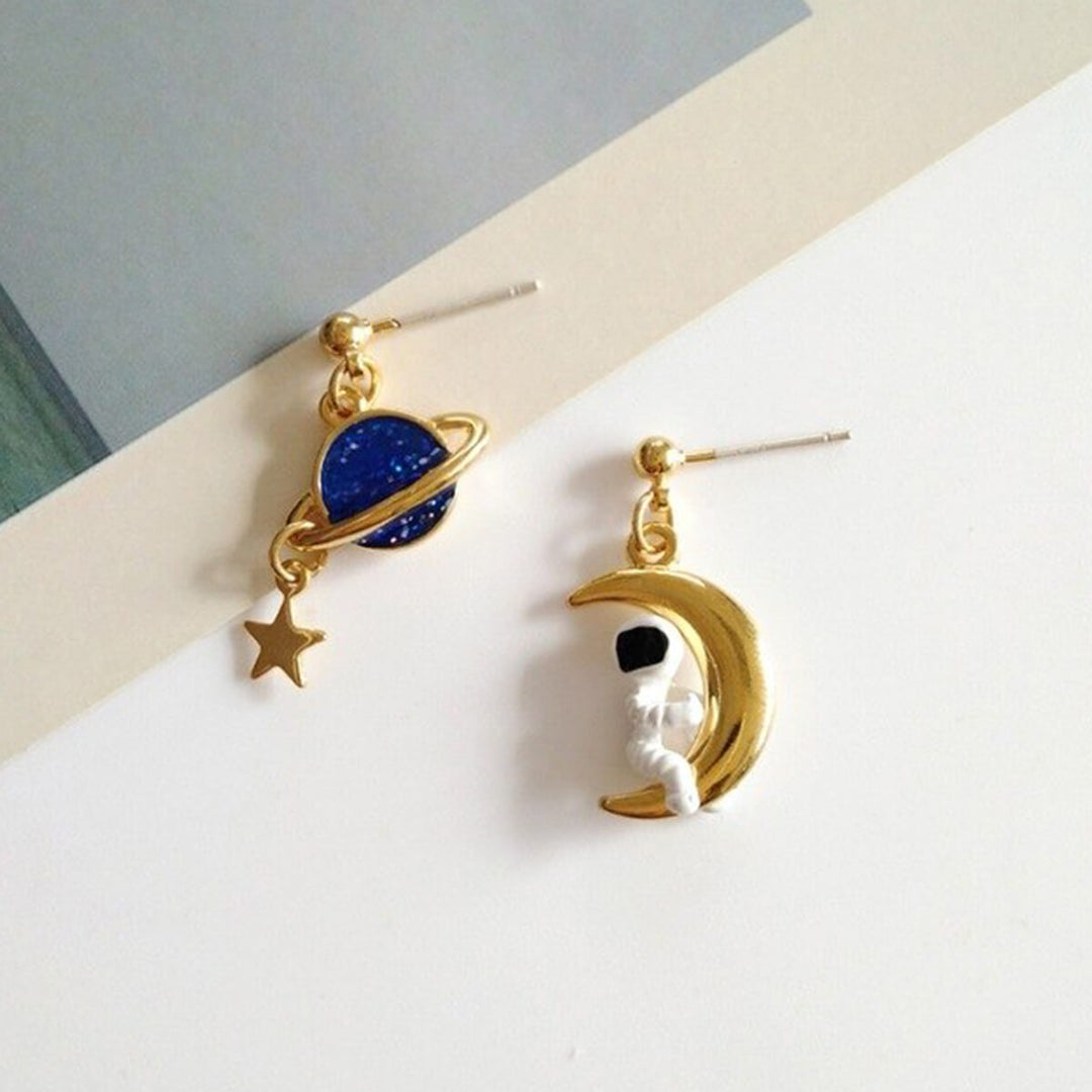 BOUCLES D'OREILLES ASTRONAUTE ET PLANÈTE (ENSEMBLE)