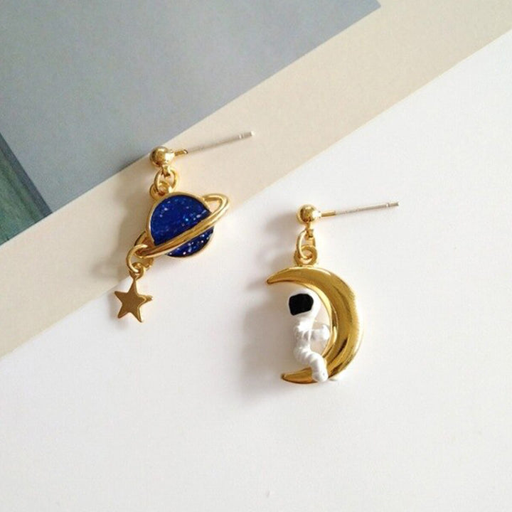 BOUCLES D'OREILLES ASTRONAUTE ET PLANÈTE (ENSEMBLE)