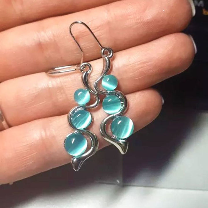 PAIRE DE BOUCLES D'OREILLES EN FORME DE GOUTTES BLEUES