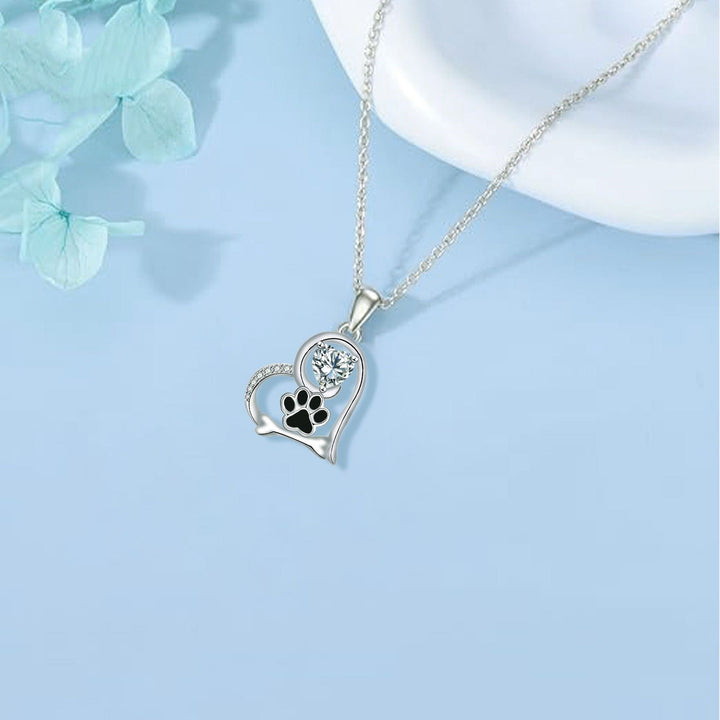 Collier en os et empreinte de patte de chien fait main avec zirconia