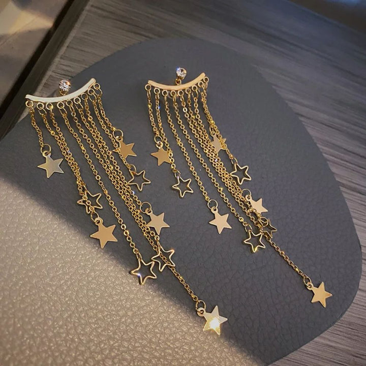 PAIRE DE BOUCLES D'OREILLES ÉTOILÉES AVEC FRANGES