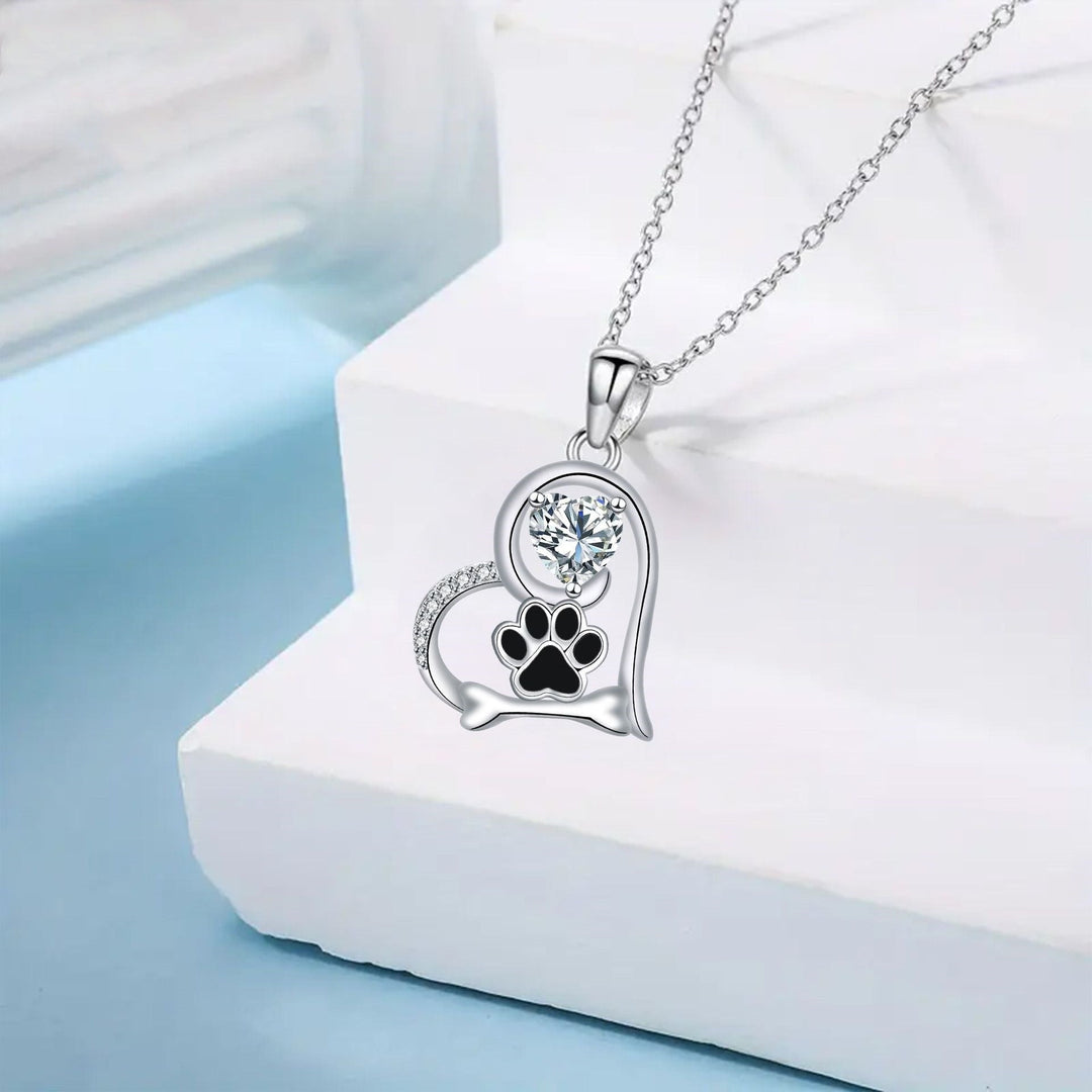 Collier en os et empreinte de patte de chien fait main avec zirconia