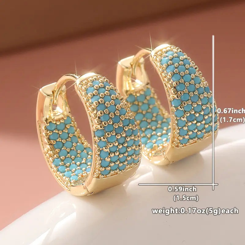 Boucles d'oreilles créoles élégantes en or avec des perles turquoise
