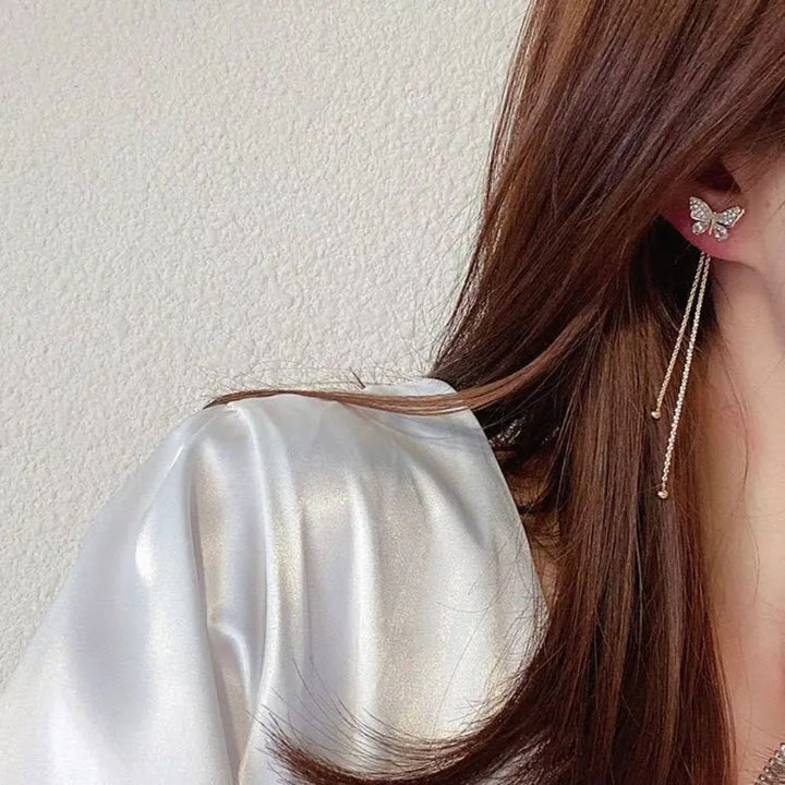 PAIRE DE BOUCLES D'OREILLES EN FORME DE PAPILLON