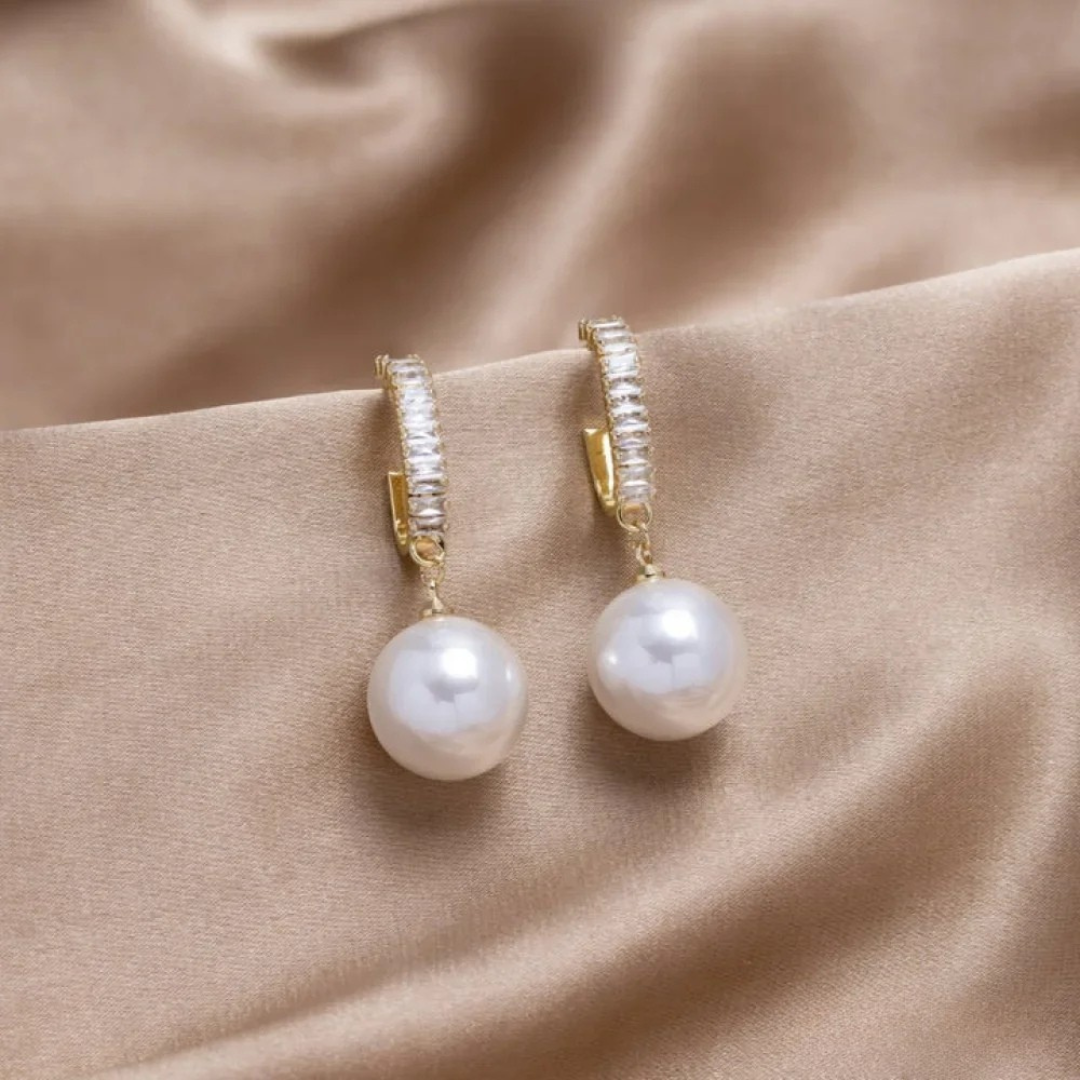 Boucles d'oreilles chiques avec perle et zircon