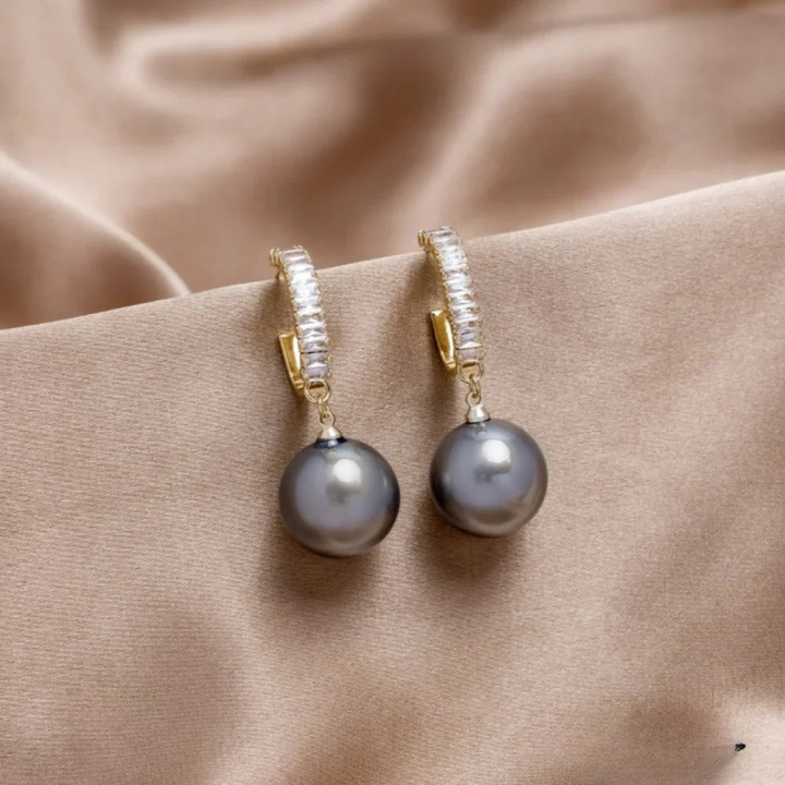 Boucles d'oreilles chiques avec perle et zircon