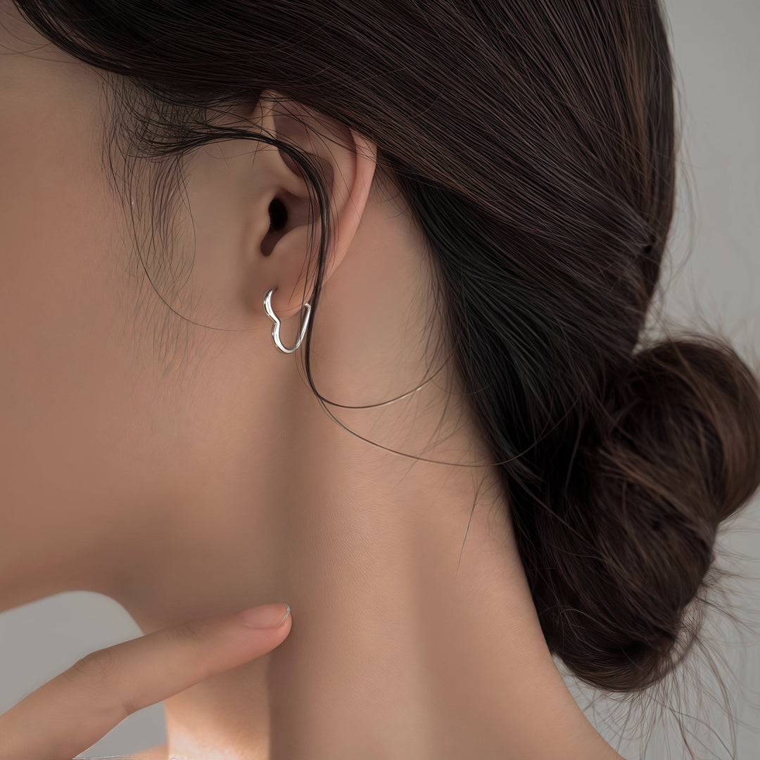 Boucles d'oreilles en forme de cœur doré en acier inoxydable