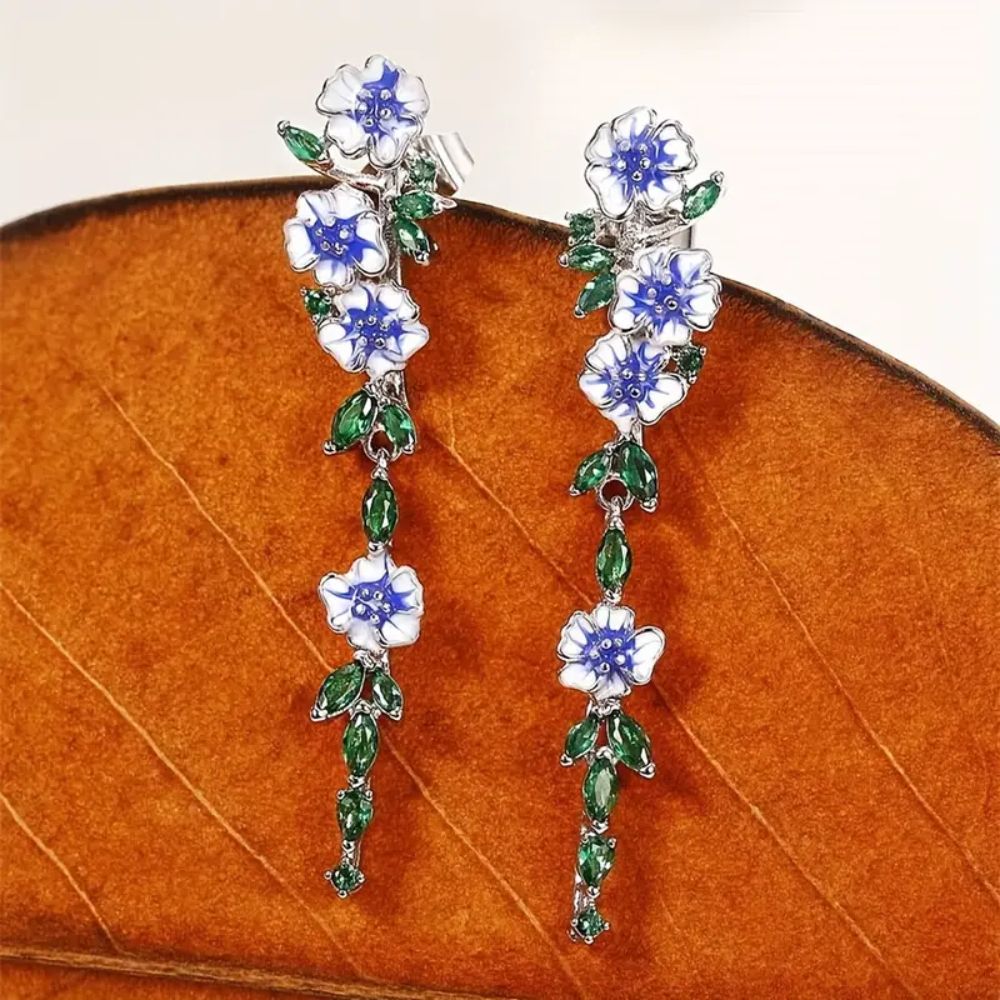 PAIRE DE BOUCLES D'OREILLES EN CHAÎNE AVEC FLEUR BLEUE