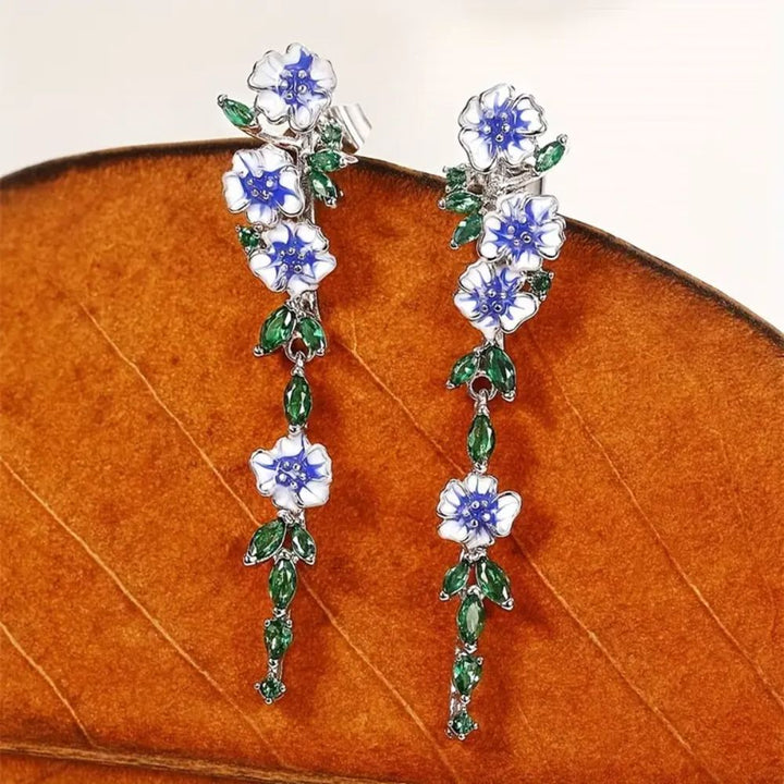 PAIRE DE BOUCLES D'OREILLES EN CHAÎNE AVEC FLEUR BLEUE