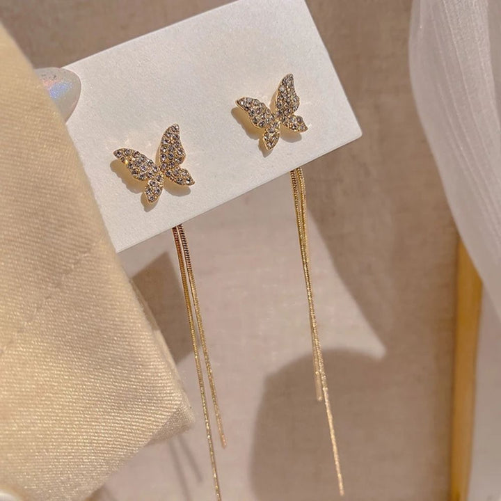 PAIRE DE BOUCLES D'OREILLES EN FORME DE PAPILLON