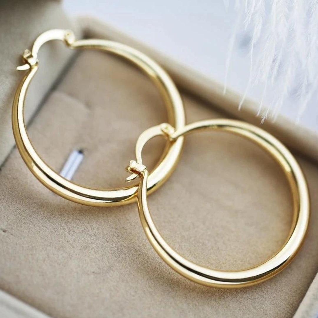 Boucles d'oreilles en or avec un grand impact