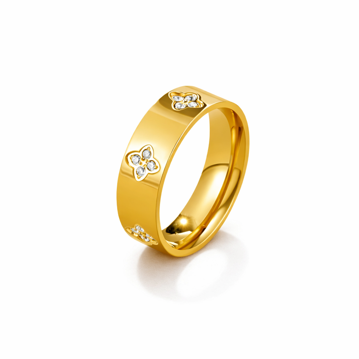Bague trèfle dorée avec cristaux