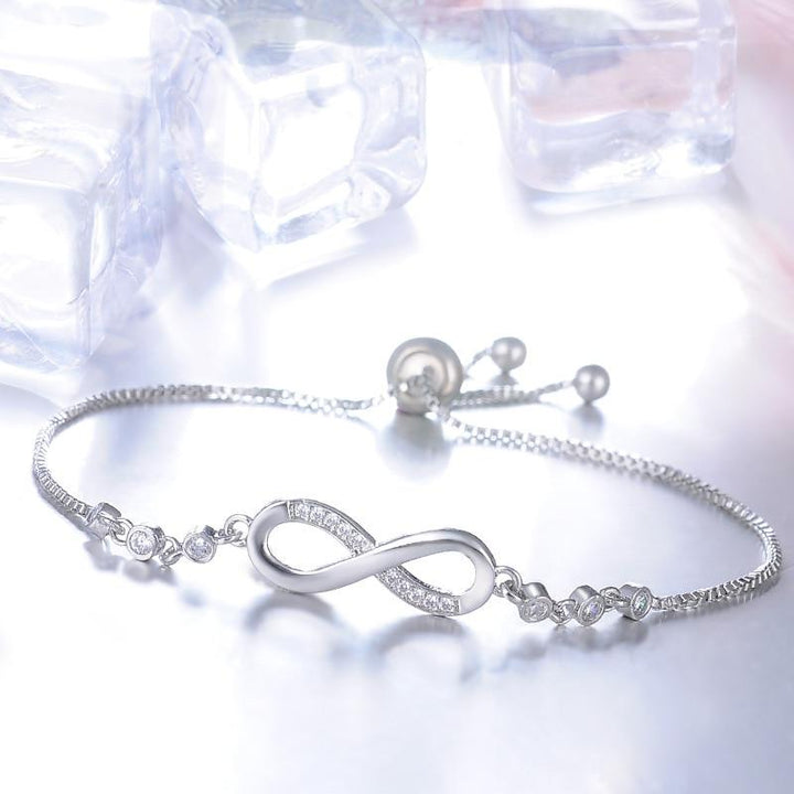 Bracelet ajustable chic en or rose en forme de symbole de l'infini