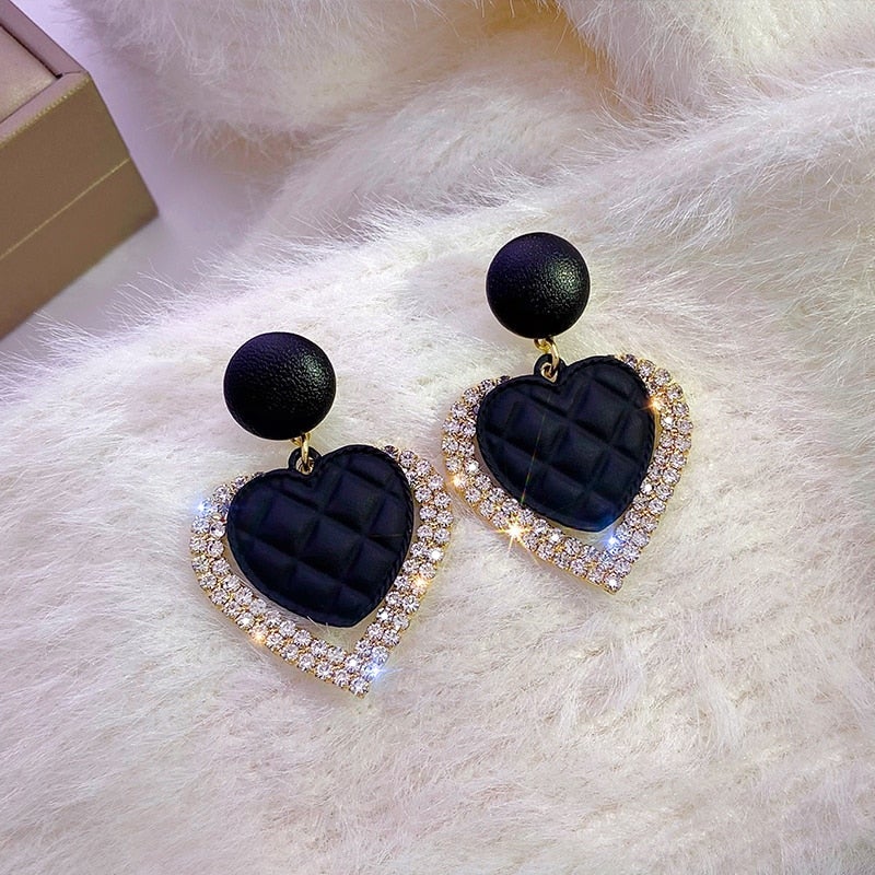 Boucles d'oreilles en forme de cœur noires en or