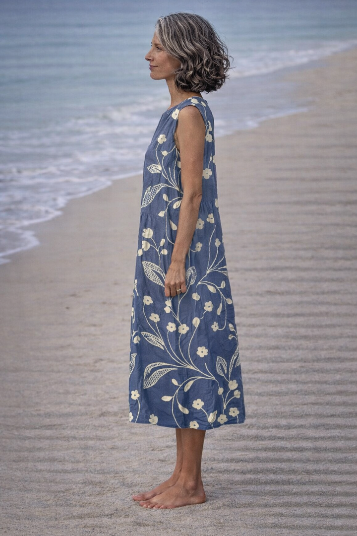 Estela | Robe midi sans manches à fleurs vintage