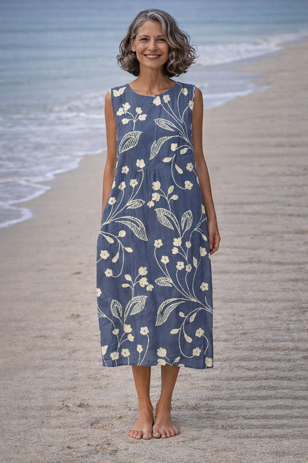 Estela | Robe midi sans manches à fleurs vintage