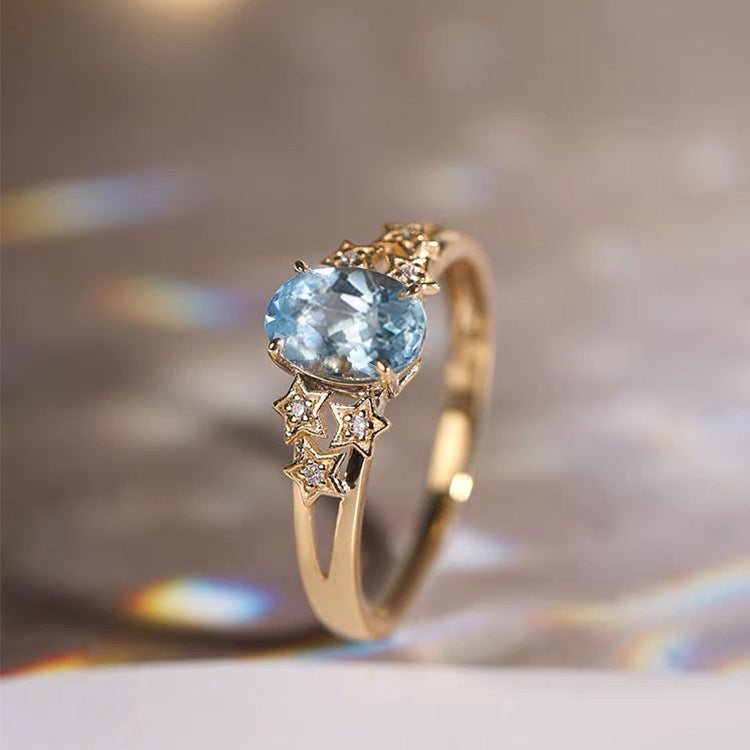 Bague en or exclusive avec cristal bleu