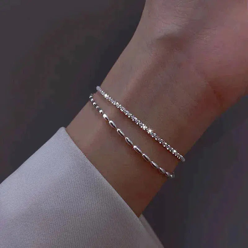 Élégant ensemble de bracelets en argent avec des pierres de zirconium
