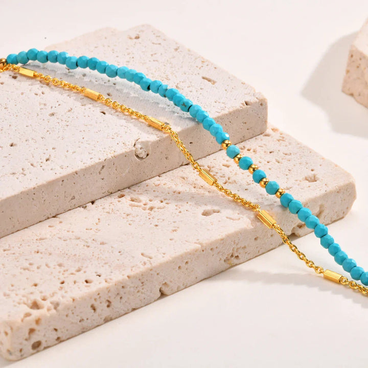 Bracelet double en or intemporel avec turquoise