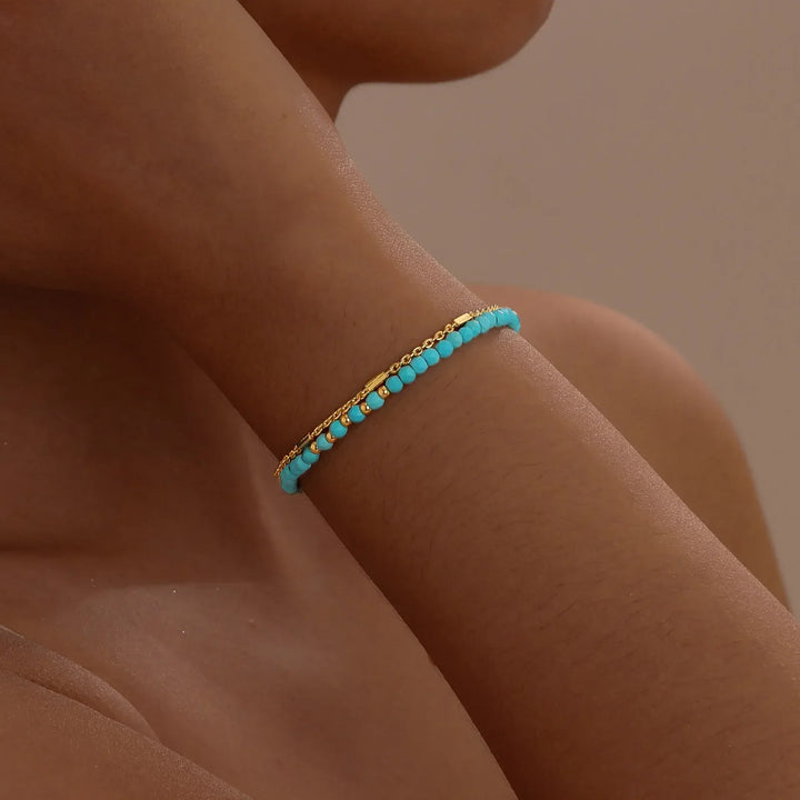 Bracelet double en or intemporel avec turquoise
