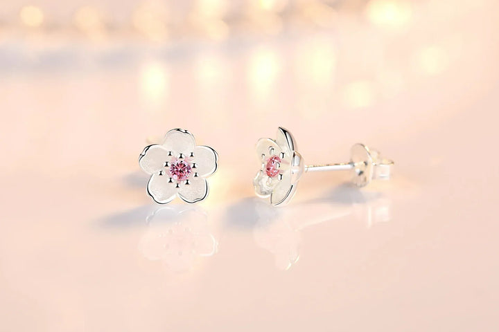 Boucles d'oreilles en forme de fleur avec zirconia