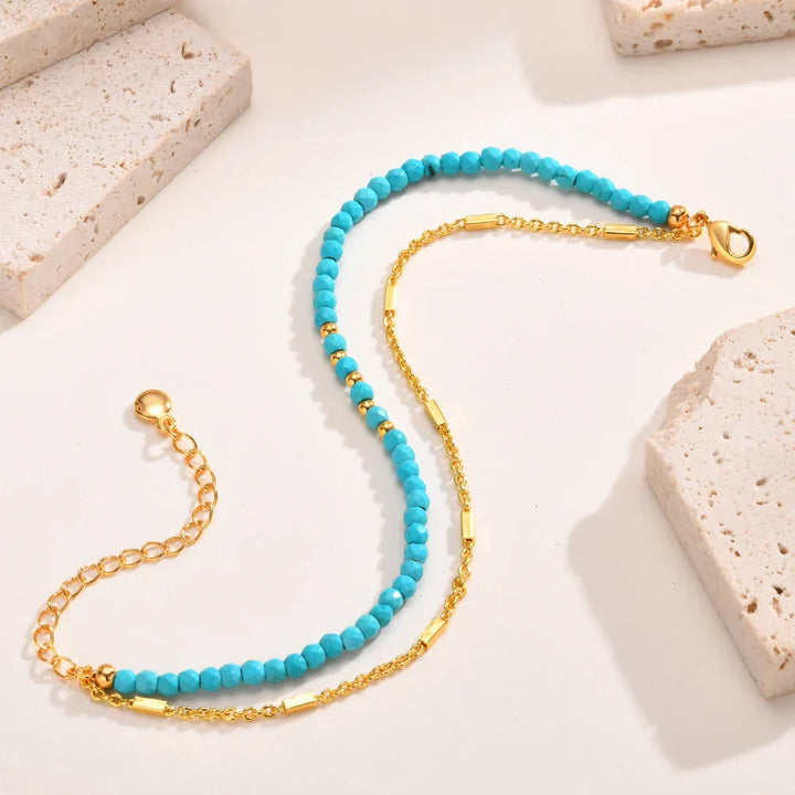 Bracelet double en or intemporel avec turquoise