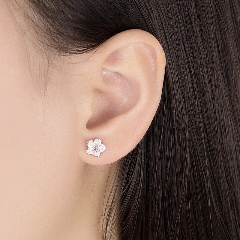 Boucles d'oreilles en forme de fleur avec zirconia