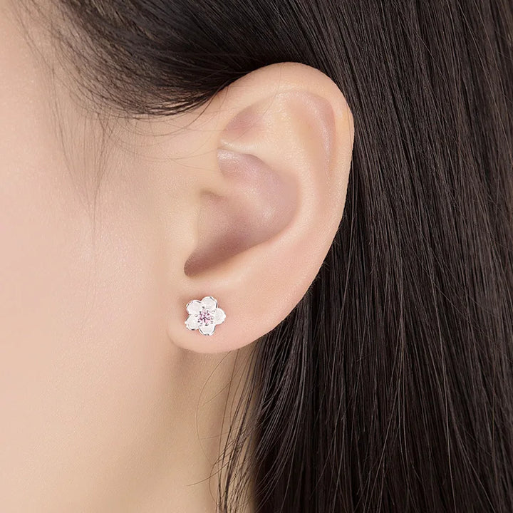 Boucles d'oreilles en forme de fleur avec zirconia