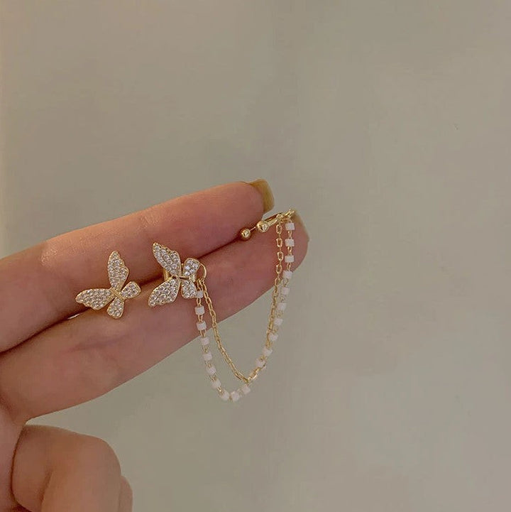 PAIRE DE BOUCLES D'OREILLES EN FORME DE PAPILLON