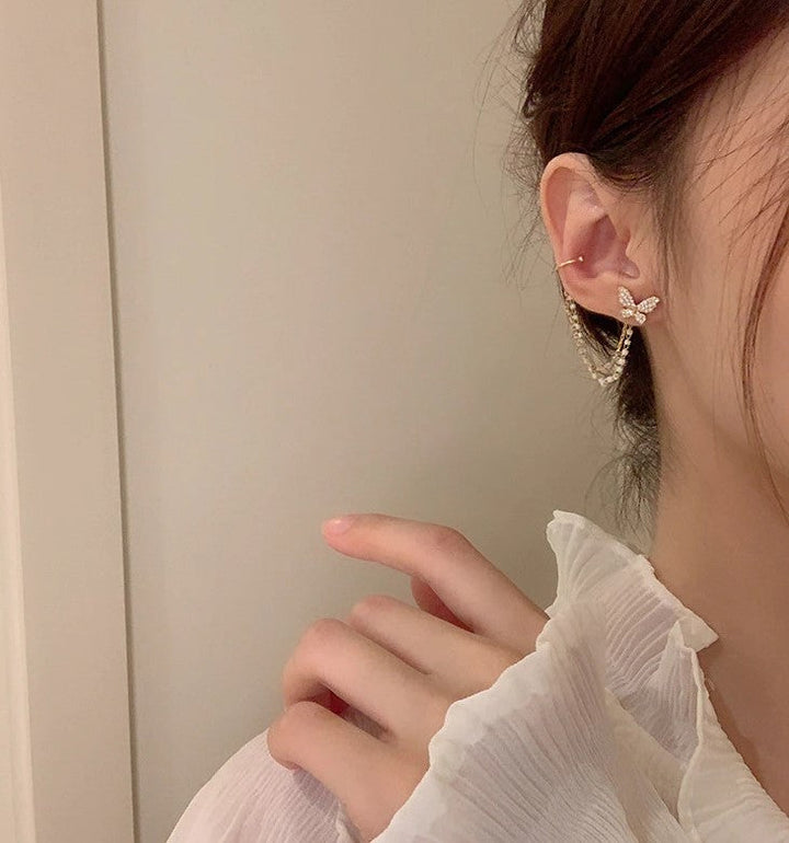 PAIRE DE BOUCLES D'OREILLES EN FORME DE PAPILLON