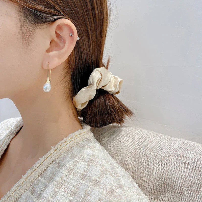Boucles d'oreilles goutte avec perles