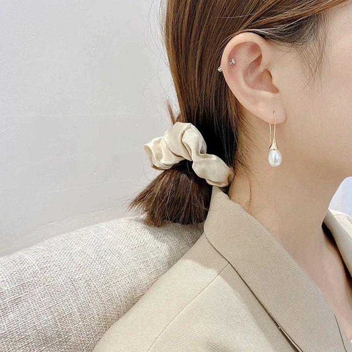 Boucles d'oreilles goutte avec perles