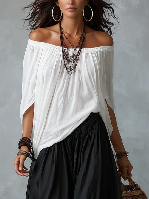 Mara • Ensemble de blouse blanche à épaules nues et pantalon palazzo noir