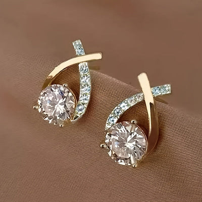 Boucles d'oreilles en puce avec croix dorée et zirconiums