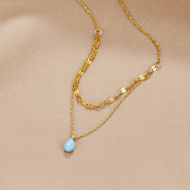 Collier à couches avec goutte d'opale bleue