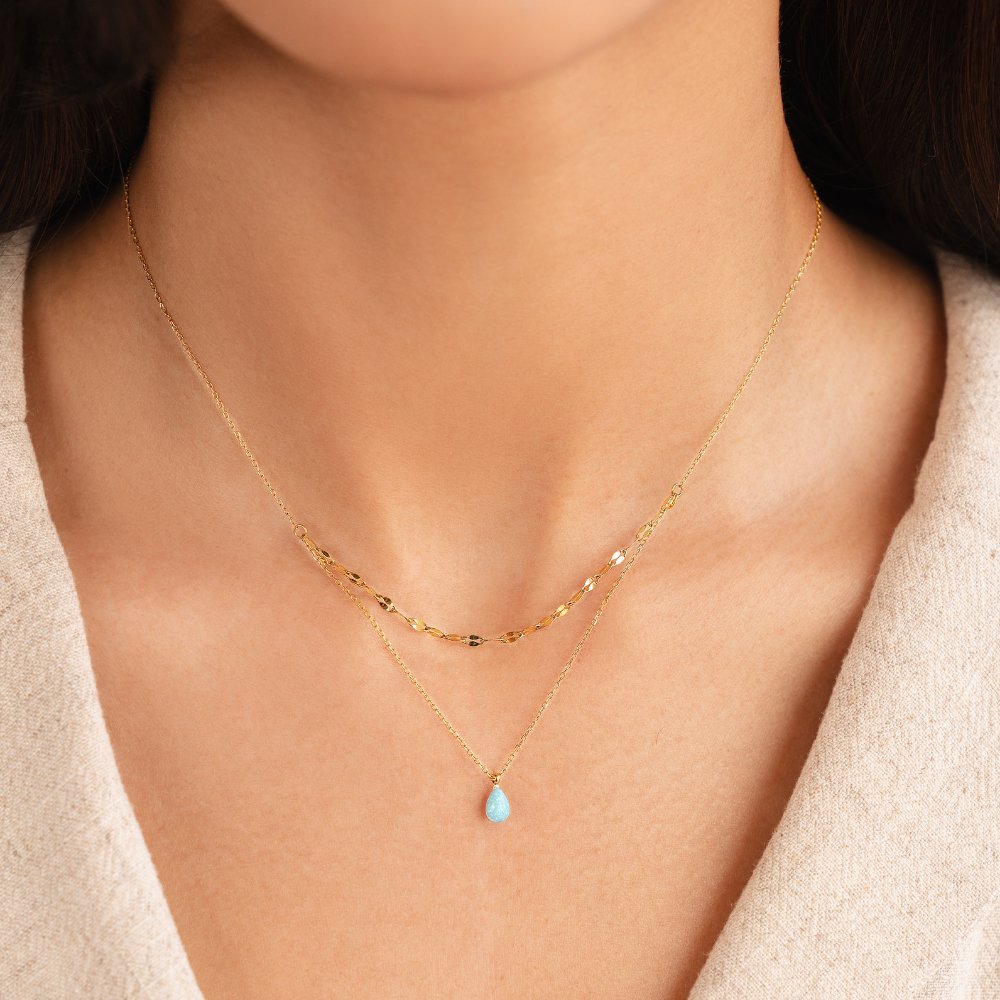 Collier à couches avec goutte d'opale bleue