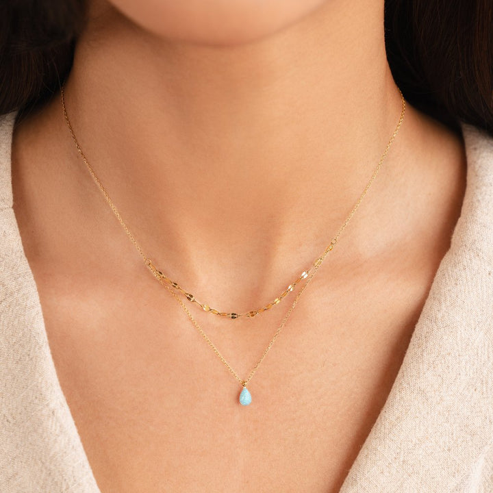 Collier à couches avec goutte d'opale bleue