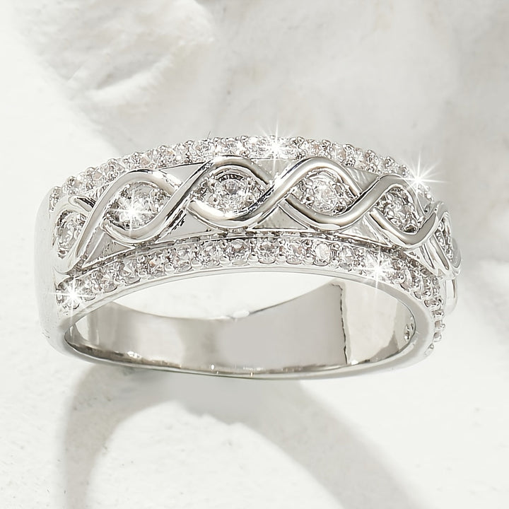 Bague en or blanc avec double rangée de zircon