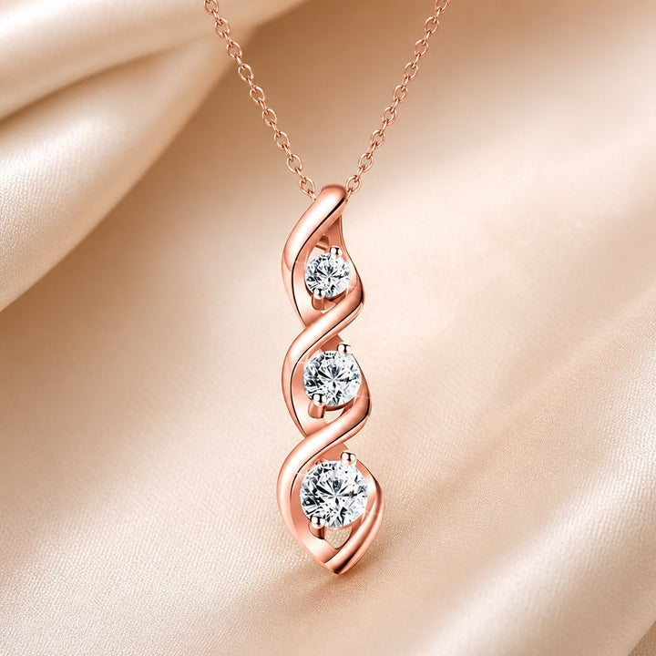 Collier en or blanc avec pendentif en forme d'infini et zircons